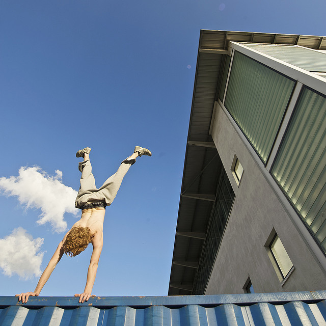 Parkour guy balancing on a ledge