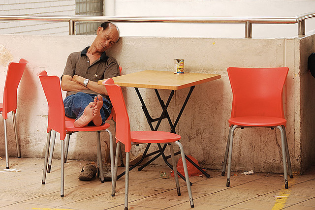 Uncle sleeping at the coffee shop